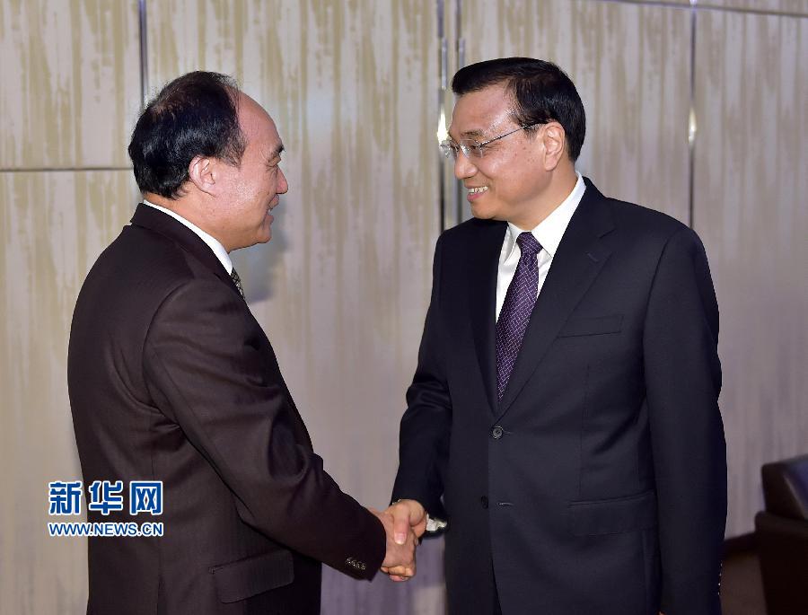 1月22日，中國國務(wù)院總理李克強(qiáng)在瑞士蘇黎世會見國際電信聯(lián)盟秘書長趙厚麟。 新華社記者 李濤 攝 
