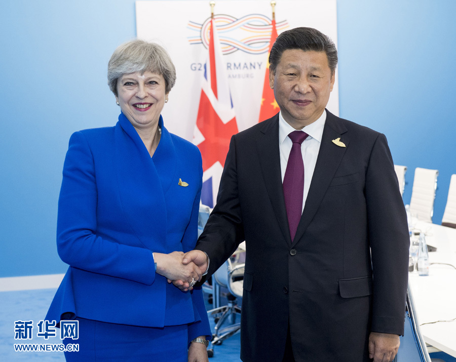 7月7日，國(guó)家主席習(xí)近平在漢堡會(huì)見(jiàn)英國(guó)首相特雷莎&middot;梅。 新華社記者李學(xué)仁 攝